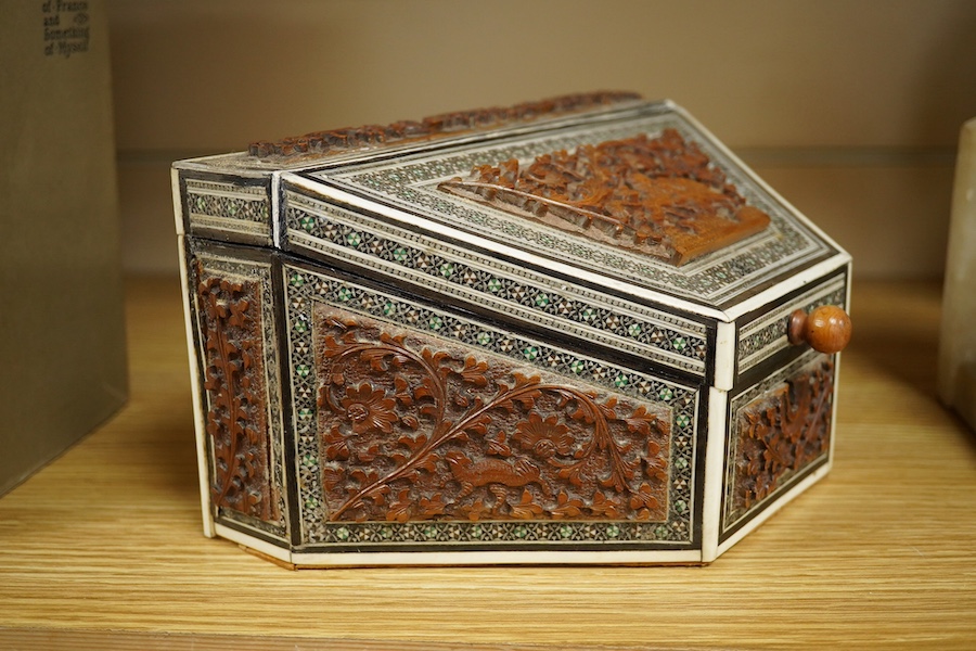 An Anglo-Indian Vizagapatam sandalwood and bone stationery box of tapered form, 23cm wide. Condition - good, base cracked